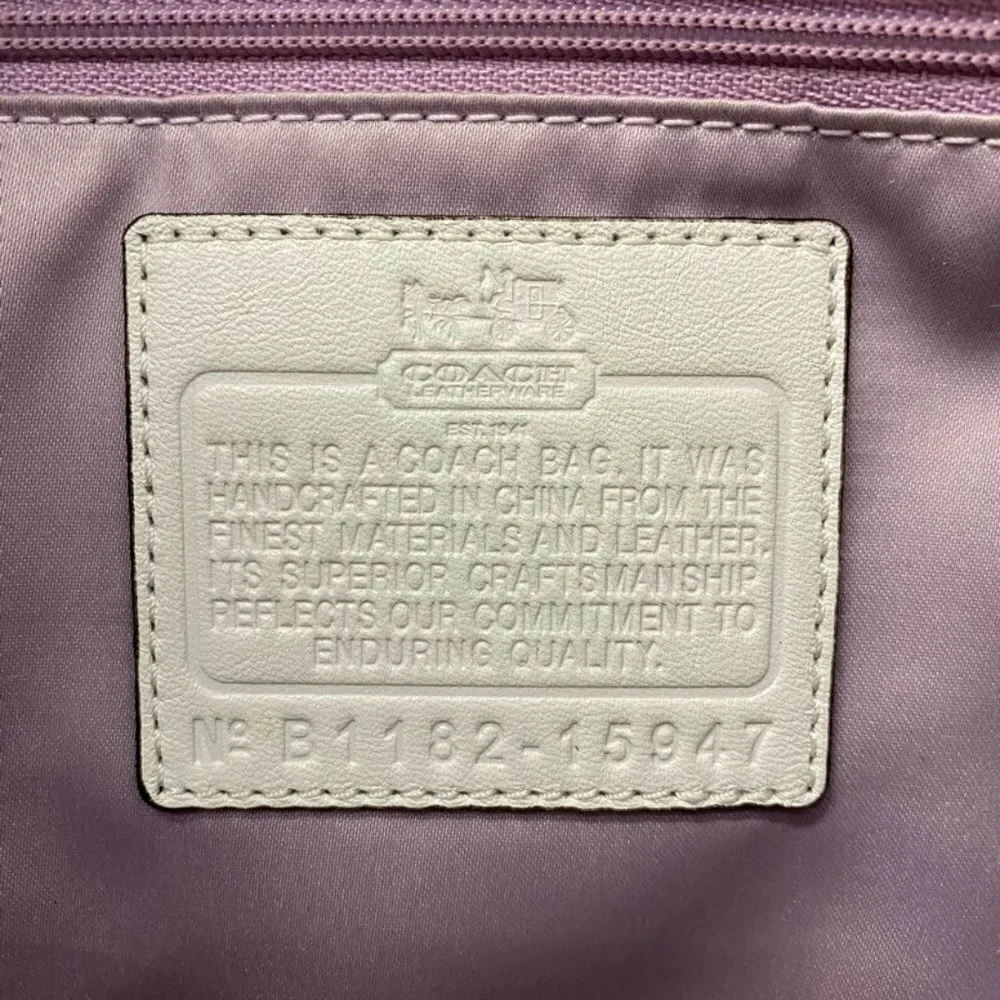Coach ivory pleated